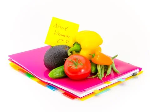 Office Documents and Vegetables; Need Vitamin C Stock Photos