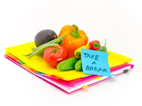 Office Documents and Vegetables; Take a Break Stock Photos