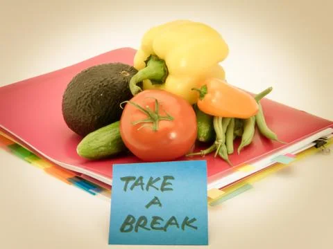 Office Documents and Vegetables; Take a Break Stock Photos