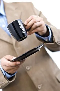 At office drinking coffee Foto stock
