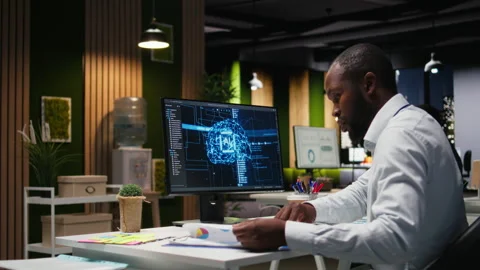 Office employee checking monthly data reports with AI analytics platform Stock Footage 318497105