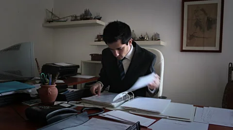 Office: Employee cotrollo archive old customers Stock Footage 54845944
