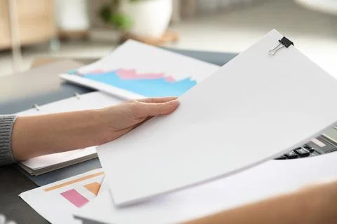 Office employee working with documents at table, closeup. Space for text Stock Photos