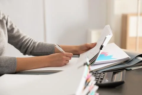 Office employee working with documents at table, closeup Stock Photos
