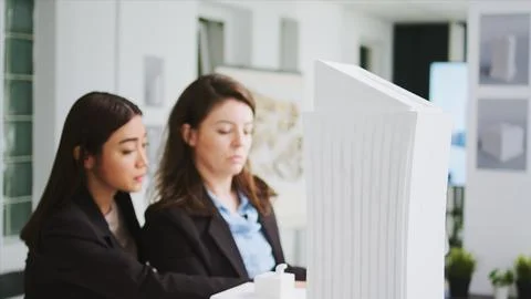 Office engineers studying 3d printed model in coworking space, 스톡 사진