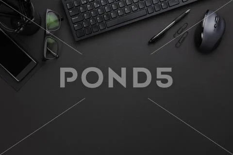 Office Equipment With Computer Keyboard And Mouse On Gray Desk Stock-Fotos