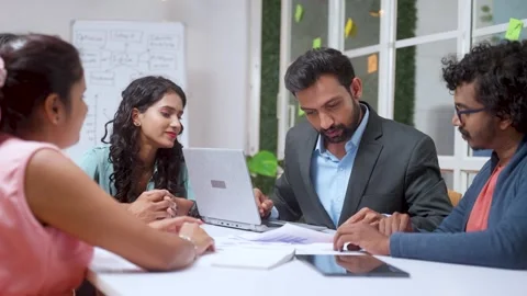 Office executive or team manager with team members clapping by greeting for Stock Footage 263871464
