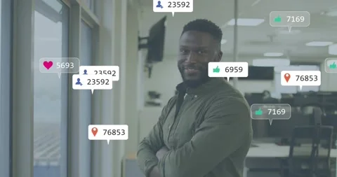 Office executive standing by window, receiving notifications and monitoring Stock Footage 318064089