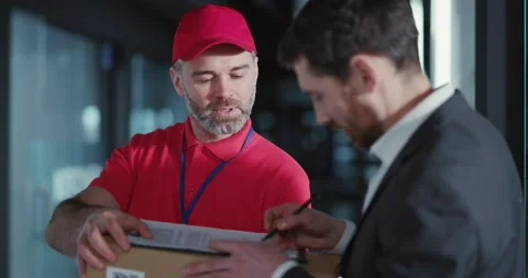 Office executive successful man receiving parcel from fast post delivery Stock Footage 151476495