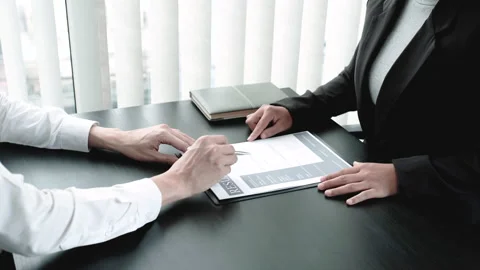 Office executives are interviewing job applicants in the meeting room Stock Footage 146106152