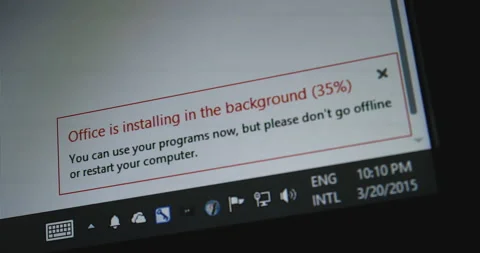 Office is installing in the background message on the Microsoft Windows software Stock Footage 208062240