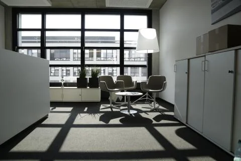 Office Interior Colored in White and Beige Stock Photos
