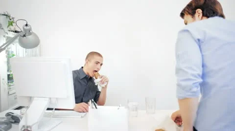 Office IT workers Still Working During Lunch Break Stock Footage 22251608