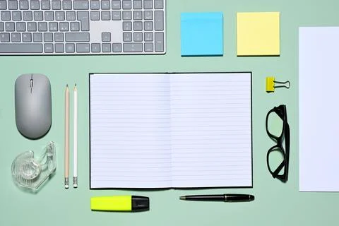 Office items on green background Stock Photos