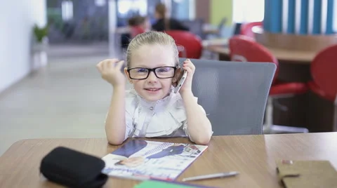 Office kid talking on phone Stock Footage 66355523