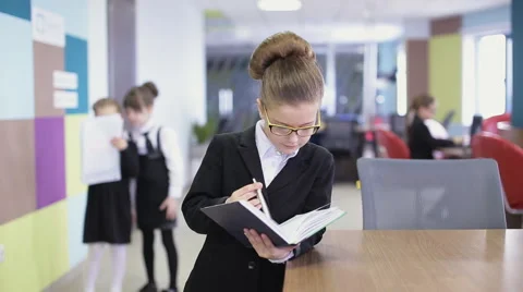 Office kid write. static shot Stock Footage 66353867