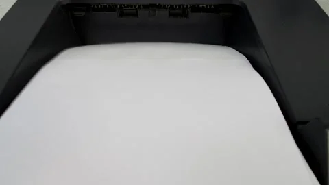 Office laser jet printer printing lots of paper Stock Footage 140996452