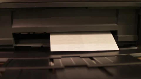 Office laser printer printing on A4 paper. The process of printing on paper Stock Footage 261380133
