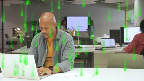 Office man glancing at laptop, typing and reading docs, causing green code Stock Footage 334337937