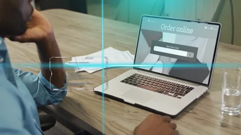 Office man moving right hand on mouse, causing cyan HUD scanning over papers Stock Footage 333610329