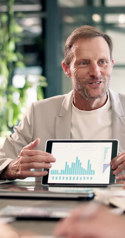 Office, man or meeting with graphs on tablet screen for annual performance, cost Stock Footage 340600927