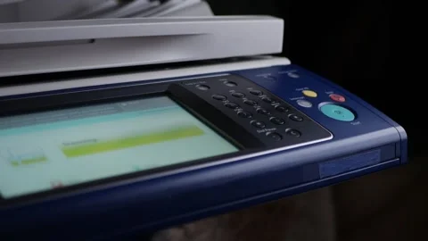 Office man press start button to using the Office printer for document printing. Stock Footage 306516768