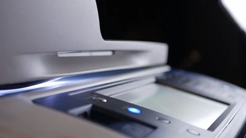 Office man press start button to using the Office printer for document printing. Stock Footage 306569549