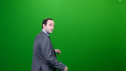 Office Man Turning to look at Camera on Green Screen 動画素材 83737694