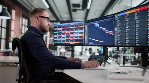 Office Man Using Multiple Screen PC Stock Footage 320765518