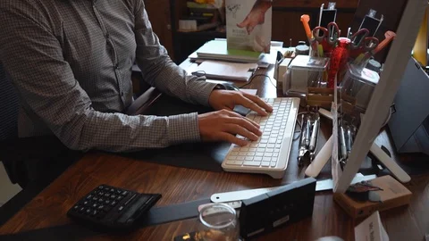 An office man working on the computer Stock Footage 129928244