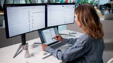 Office Manager Carefully Organizing Documents Stock Footage 336373320