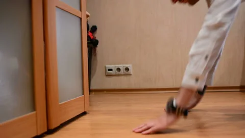 Office manager doing push-ups in at home Stock Footage 91186452