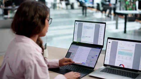 Office Manager Efficiently Organizing Digital Documents Stock Footage 345334624
