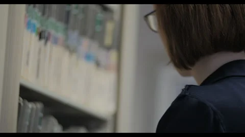 Office Manager going through medical records Stock Footage 40273974