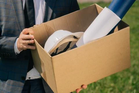Office manager s box with things after dismissal. The concept of a manager's  Stock Photos