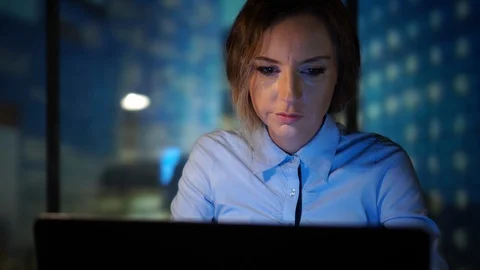 Office Manager typing on the Keybord, Using Laptop, Stock Market, Checking the Stock Footage 95408569