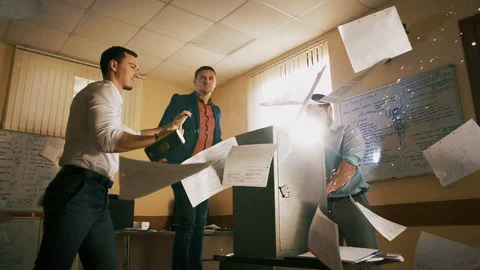 Office managers are trying to radically open a safe with important documents. Stock Footage 105294638