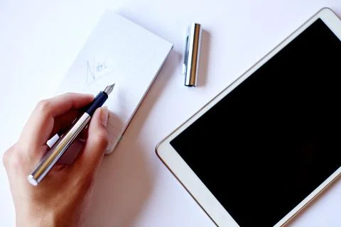 Office, notes and hand with notepad, tablet and ideas for novel, mockup spa.. Foto stock