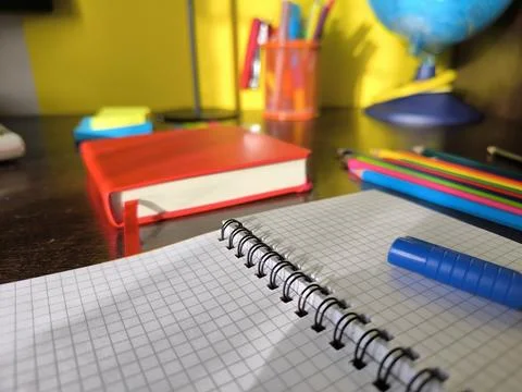 Office objects on the desktop, against the background of the globe Stock Photos