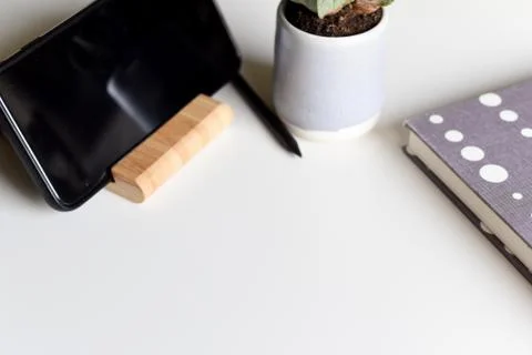 Office objects on a white desk in light modern style with copy space Stock Photos
