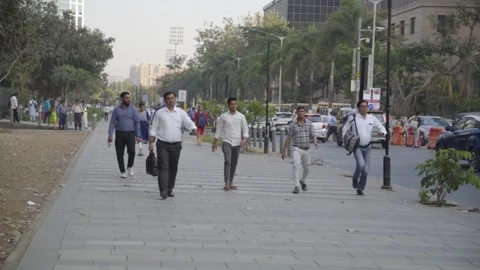Office people walking down the streets after the office working hours are Stock Footage 239963450