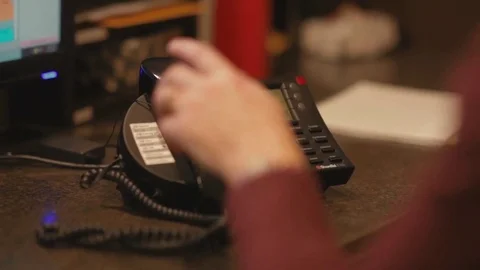 Office phone pick-up Stock Footage 70997380