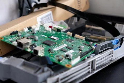 Office printer circuit board during repair Stock Photos