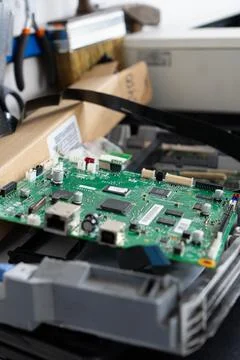 Office printer circuit board during repair Stock Photos