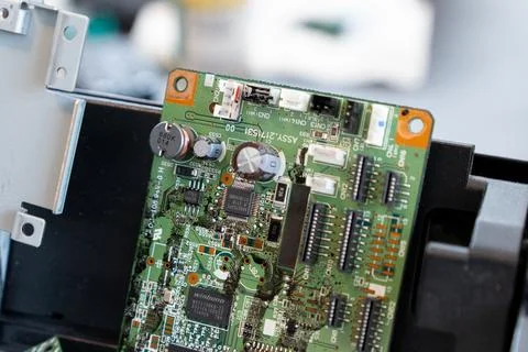 Office printer circuit board during repair Stock Photos