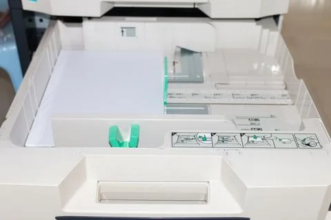 Office printer maintenance routine office space how-to guide indoor setting.. Stock Photos