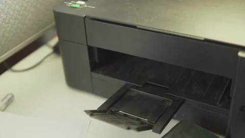 Office printer printing important business documents Stock Footage 320968250