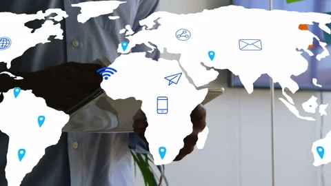 Office pro tapping tablet, animating world map overlay with icons and Stock Footage 334351609