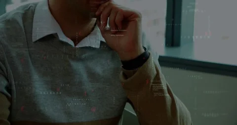 Office professional clicking mouse and resting chin while reviewing tech code Stock Footage 331085477