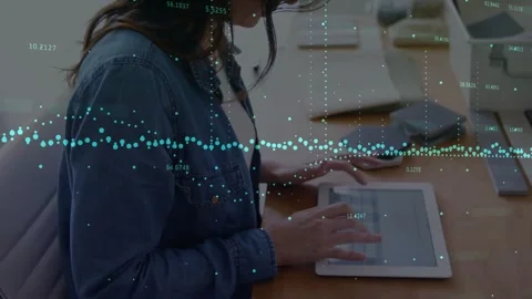 Office professional tapping tablet screen and animating digital waveform for Stock Footage 318239503